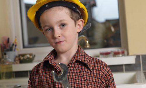 Boy dressed as builder